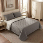 Cubrecama reversible color plomo zareck y vapor diseño lineas Horizontales